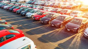 a variety of cars in a dealership